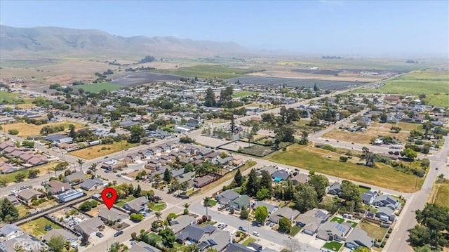 bird's eye view featuring a mountain view and a residential view