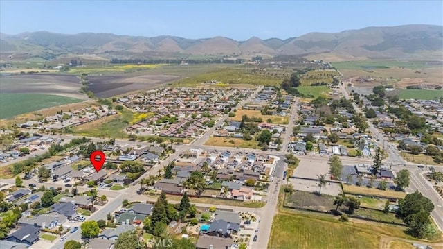 bird's eye view with a residential view and a mountain view
