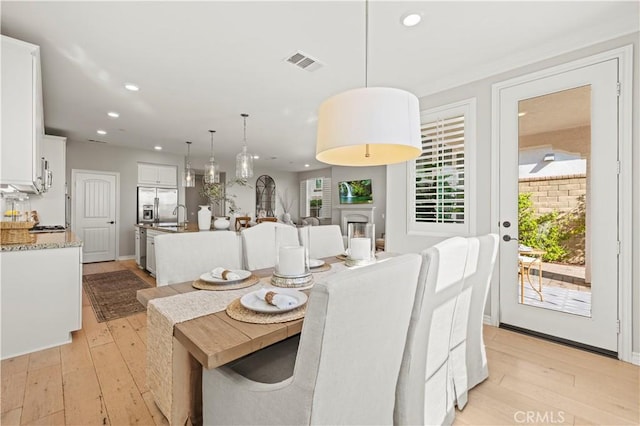 29034 Via Patina, Valencia, CA 91354 - dining space with recessed lighting and light wood finished floors