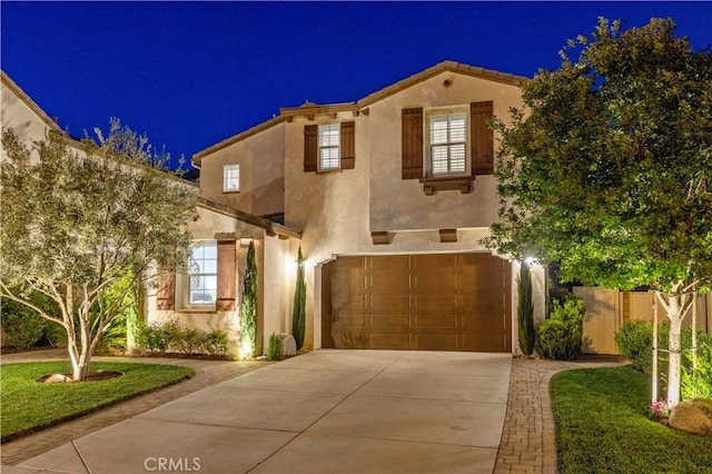 29034 Via Patina, Valencia, CA 91354 - mediterranean / spanish house with driveway, stucco siding, and a garage