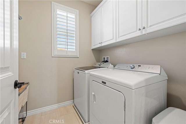 29034 Via Patina, Valencia, CA 91354 - laundry area featuring separate washer and dryer and cabinet space