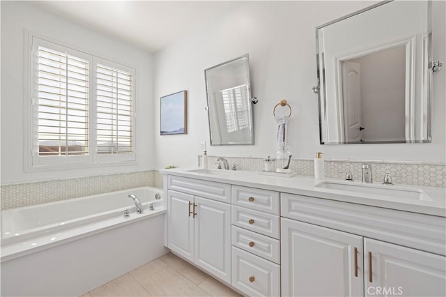 29034 Via Patina, Valencia, CA 91354 - full bath with double vanity, a garden tub, and tile patterned floors