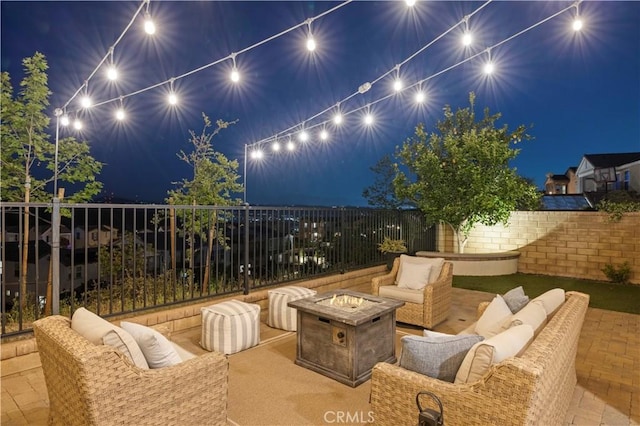 29034 Via Patina, Valencia, CA 91354 - patio at twilight with an outdoor living space with a fire pit and a patio area