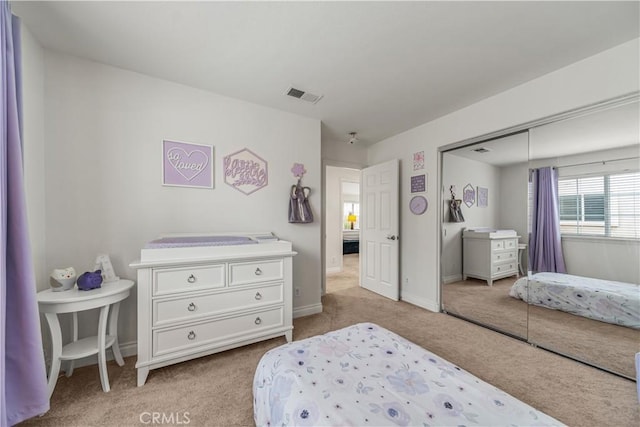 28823 Tonya St, Murrieta, CA 92563 - bedroom with light colored carpet, a closet, baseboards, and visible vents