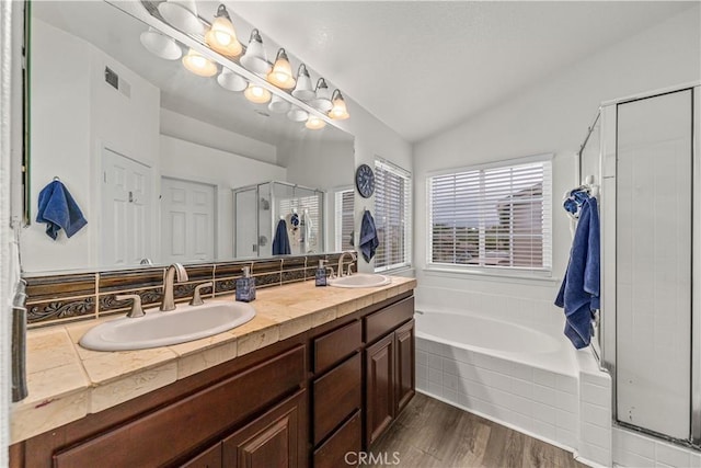 28823 Tonya St, Murrieta, CA 92563 - bathroom featuring a bath, visible vents, a shower stall, and a sink