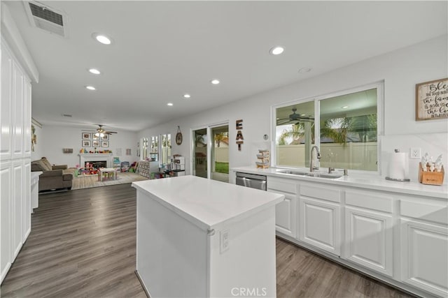 28823 Tonya St, Murrieta, CA 92563 - kitchen featuring recessed lighting, a center island, ceiling fan, and a sink