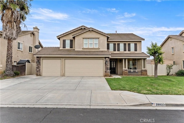 28823 Tonya St, Murrieta, CA 92563 - view of front facade featuring covered porch, fence, driveway, a tiled roof, and a front lawn
