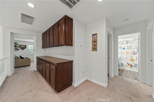 28823 Tonya St, Murrieta, CA 92563 - hallway with light carpet, baseboards, and visible vents