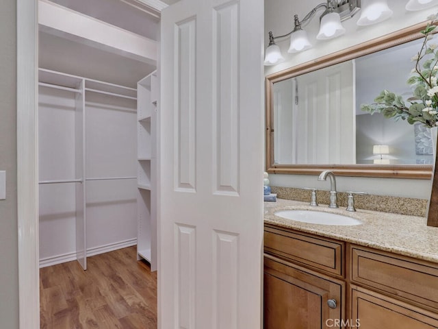 22661 Claude Cir, Lake Forest, CA 92630 - bathroom featuring vanity and wood finished floors