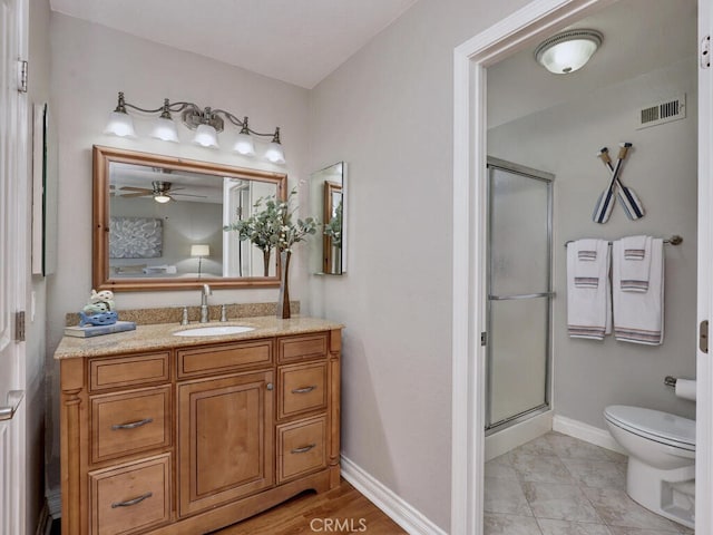 22661 Claude Cir, Lake Forest, CA 92630 - bathroom featuring a shower stall, vanity, and a ceiling fan