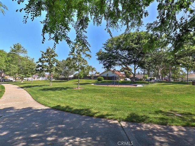 22661 Claude Cir, Lake Forest, CA 92630 - surrounding community featuring a lawn