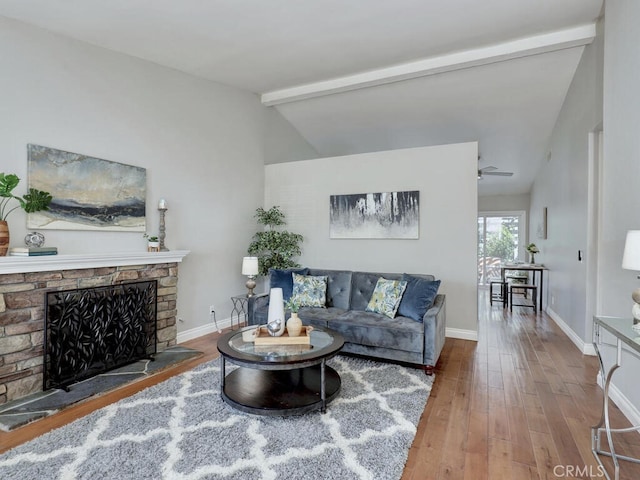 22661 Claude Cir, Lake Forest, CA 92630 - living area featuring wood finished floors, a fireplace, and ceiling fan
