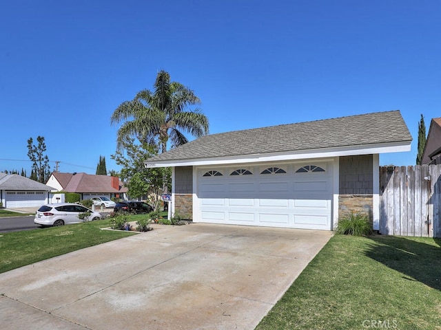 22661 Claude Cir, Lake Forest, CA 92630 - view of front of property featuring stone siding, a garage, and driveway