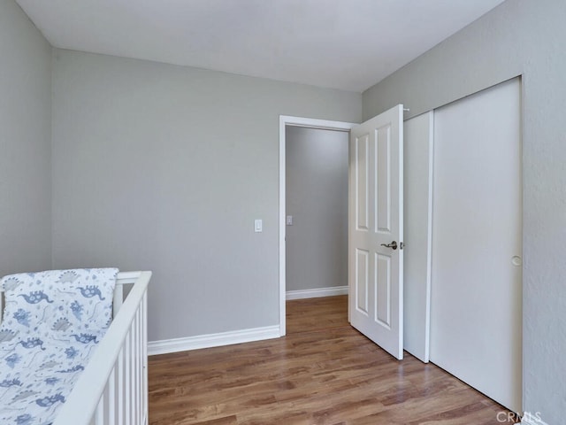 22661 Claude Cir, Lake Forest, CA 92630 - bedroom with wood finished floors, baseboards, and a closet