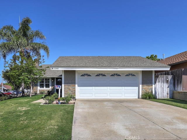 22661 Claude Cir, Lake Forest, CA 92630 - single story home featuring stone siding, concrete driveway, an attached garage, and roof with shingles