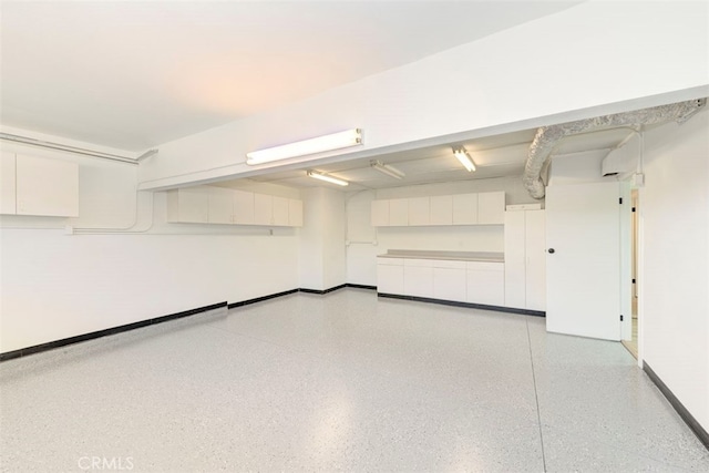 1760 N Yurok St, Orange, CA 92867 - garage featuring baseboards