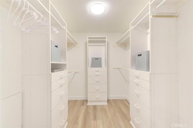 1760 N Yurok St, Orange, CA 92867 - walk in closet featuring light wood-style flooring