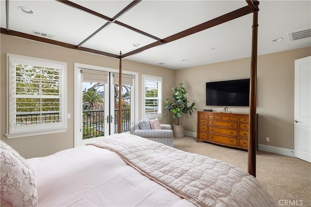 bedroom with carpet floors, access to exterior, and baseboards