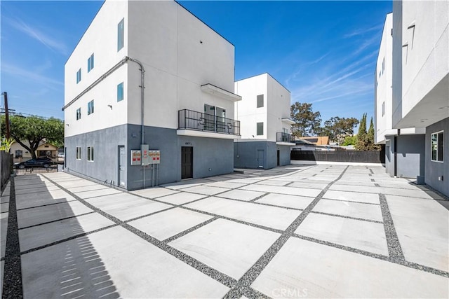 view of patio / terrace featuring fence