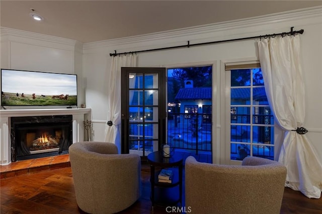 9 Maverick Ln, Bell Canyon, CA 91307 - living area featuring crown molding, a lit fireplace, and wood finished floors