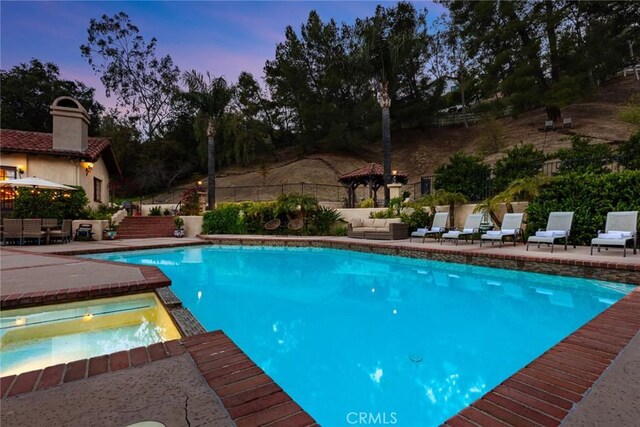 9 Maverick Ln, Bell Canyon, CA 91307 - view of pool featuring outdoor lounge area, a patio area, and a pool with connected hot tub