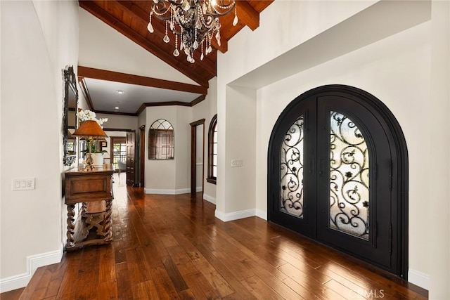 9 Maverick Ln, Bell Canyon, CA 91307 - foyer entrance featuring arched walkways, a chandelier, beam ceiling, high vaulted ceiling, and wood-type flooring