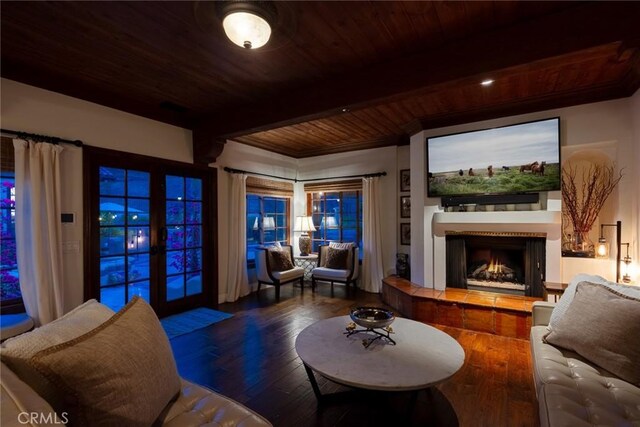 9 Maverick Ln, Bell Canyon, CA 91307 - living room with hardwood / wood-style floors, a fireplace, wooden ceiling with exposed beams, and french doors