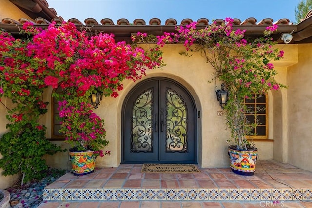9 Maverick Ln, Bell Canyon, CA 91307 - entrance to property with stucco siding and french doors
