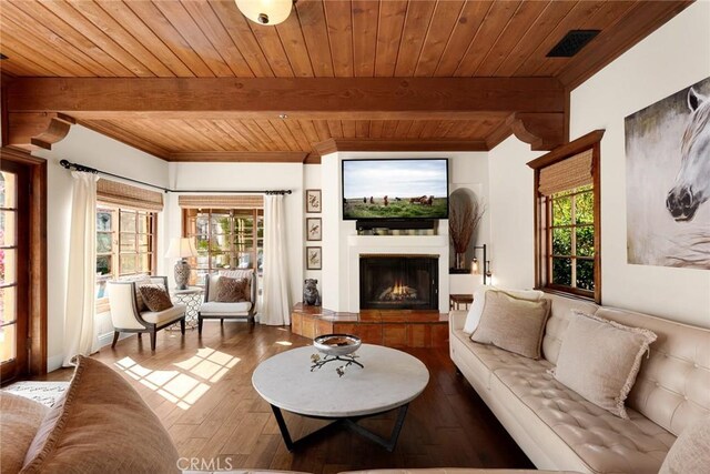 9 Maverick Ln, Bell Canyon, CA 91307 - living room with wood ceiling with exposed beams, a lit fireplace, hardwood / wood-style floors, and crown molding