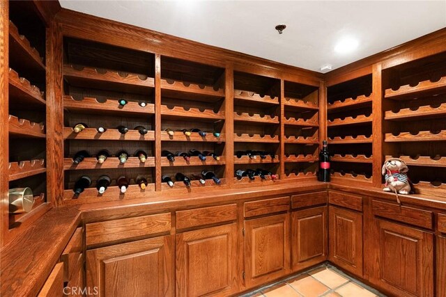 9 Maverick Ln, Bell Canyon, CA 91307 - wine room featuring light tile patterned floors