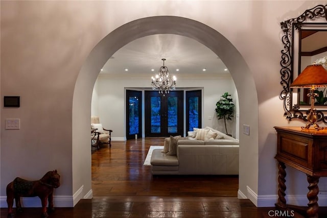 9 Maverick Ln, Bell Canyon, CA 91307 - living area featuring arched walkways, a chandelier, hardwood / wood-style flooring, baseboards, and recessed lighting