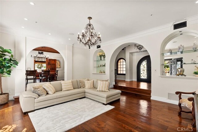 9 Maverick Ln, Bell Canyon, CA 91307 - living area featuring a chandelier, arched walkways, recessed lighting, hardwood / wood-style floors, and built in features