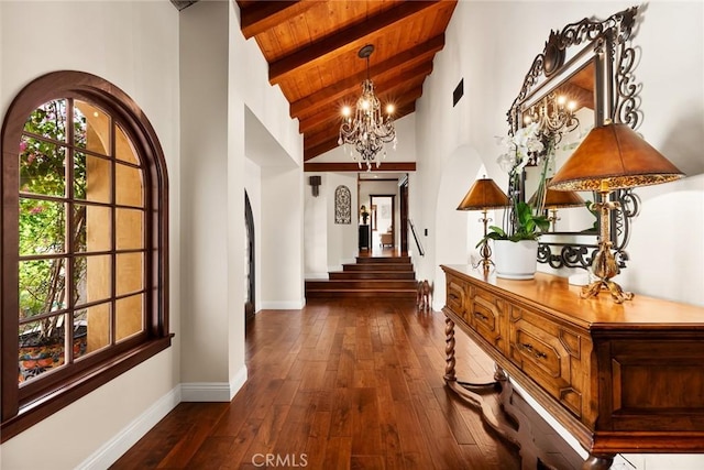 9 Maverick Ln, Bell Canyon, CA 91307 - hall with wooden ceiling with exposed beams, a chandelier, baseboards, dark wood-style flooring, and stairs