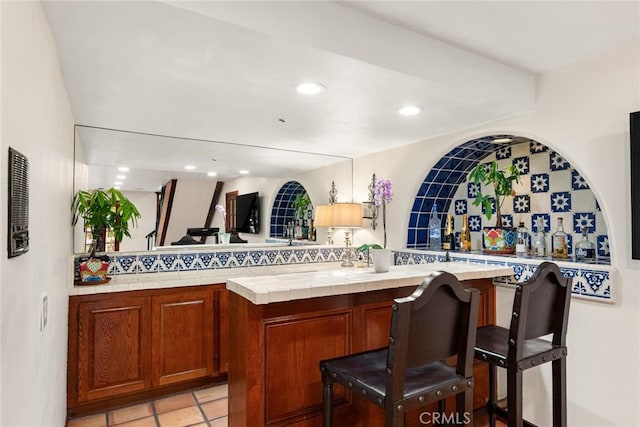 9 Maverick Ln, Bell Canyon, CA 91307 - bar area with backsplash, recessed lighting, and light tile patterned floors