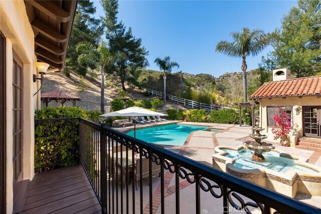 9 Maverick Ln, Bell Canyon, CA 91307 - balcony featuring view of pool area, a mountain view, and a patio