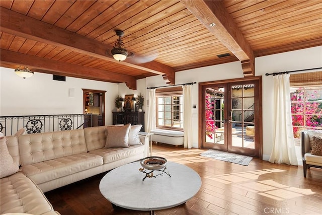 9 Maverick Ln, Bell Canyon, CA 91307 - living area with wooden ceiling with exposed beams, ceiling fan, wood-type flooring, and french doors