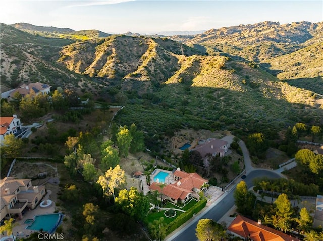 9 Maverick Ln, Bell Canyon, CA 91307 - view of property location featuring a pool and a mountainous background