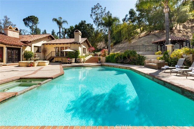 9 Maverick Ln, Bell Canyon, CA 91307 - view of swimming pool with stairs, a patio, french doors, a pool with connected hot tub, and a gazebo