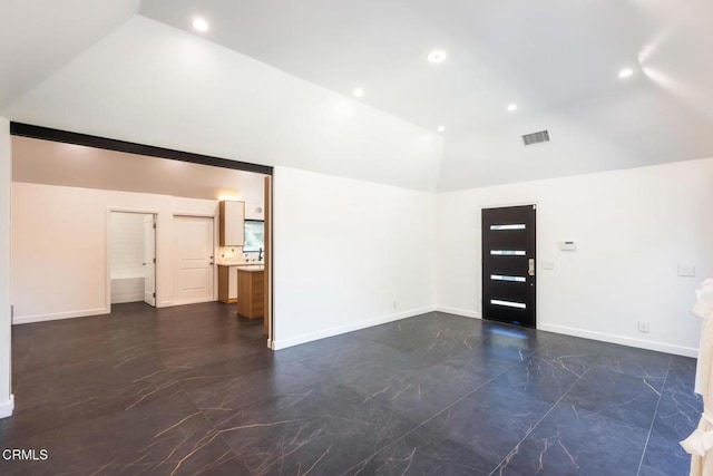 empty room featuring dark marble finish floors, high vaulted ceiling, recessed lighting, and baseboards