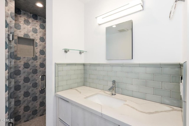 7572 Mcgroarty Ter, Tujunga, CA 91042 - full bath featuring a shower stall, vanity, decorative backsplash, and recessed lighting