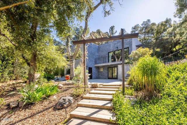 7572 Mcgroarty Ter, Tujunga, CA 91042 - view of front of property with a balcony, a patio, and french doors