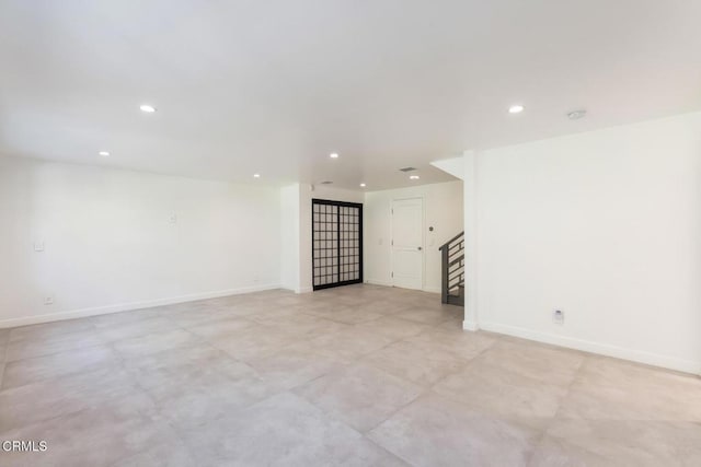 7572 Mcgroarty Ter, Tujunga, CA 91042 - unfurnished room featuring stairs, recessed lighting, baseboards, and a smoke detector