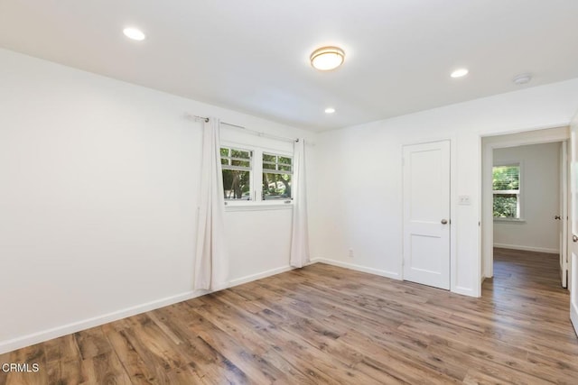 7580 Mcgroarty Ter, Tujunga, CA 91042 - spare room featuring wood finished floors, recessed lighting, baseboards, and a smoke detector
