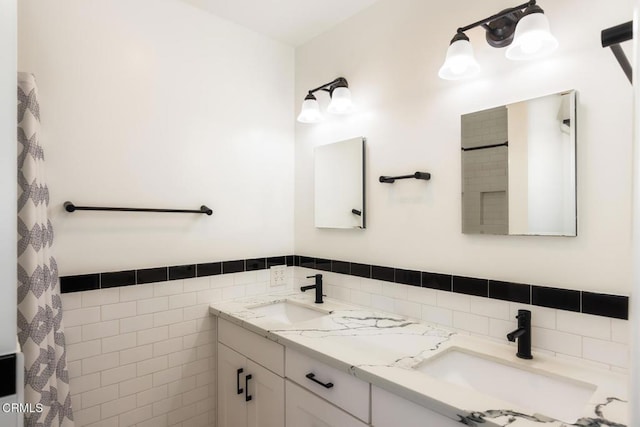 7580 Mcgroarty Ter, Tujunga, CA 91042 - bathroom with double vanity and tile walls