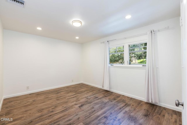 7580 Mcgroarty Ter, Tujunga, CA 91042 - empty room featuring wood finished floors, baseboards, and recessed lighting