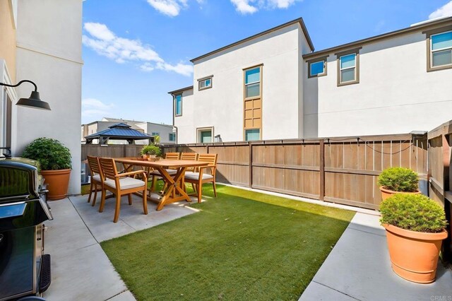 2167 Trevi Cir, Chula Vista, CA 91913 - fenced backyard featuring a gazebo, a patio area, and outdoor dining area