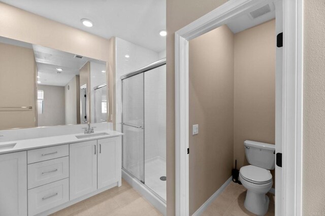 2167 Trevi Cir, Chula Vista, CA 91913 - full bath with double vanity, a shower stall, and tile patterned flooring