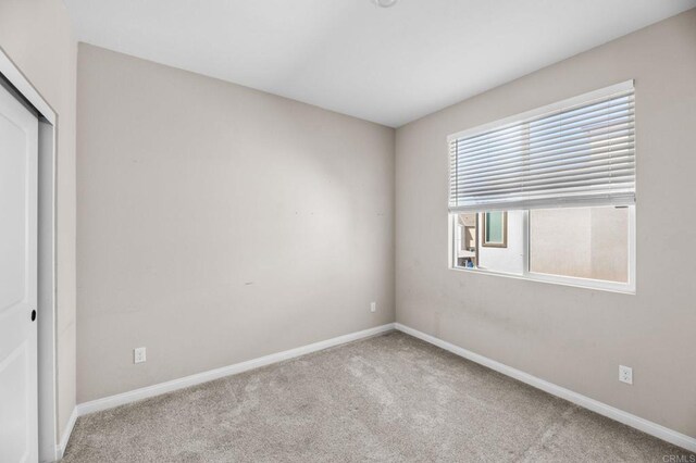 2167 Trevi Cir, Chula Vista, CA 91913 - empty room with carpet flooring and baseboards