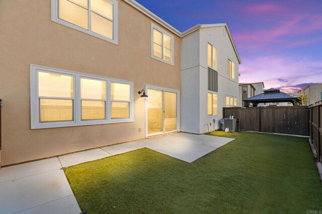 2167 Trevi Cir, Chula Vista, CA 91913 - back of property with a gazebo, a patio, and stucco siding
