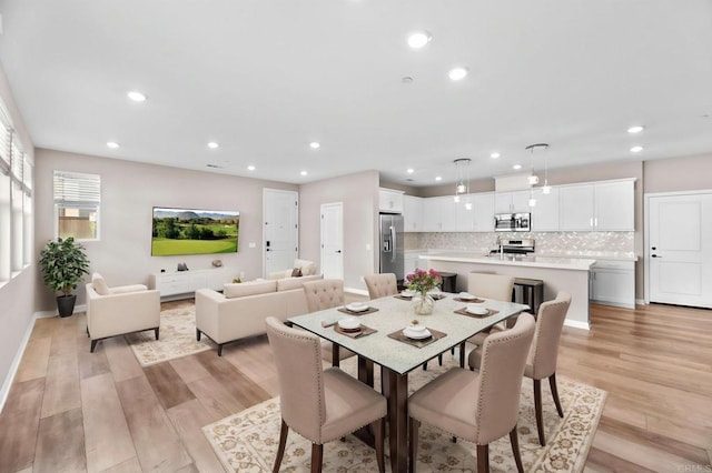 2167 Trevi Cir, Chula Vista, CA 91913 - dining area featuring light wood-style flooring and recessed lighting